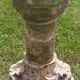 Holy water font on stone column (17th century)