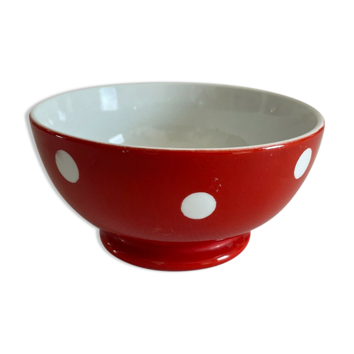 Red bowl with white polka dots signed Longchamp Porcelaine France