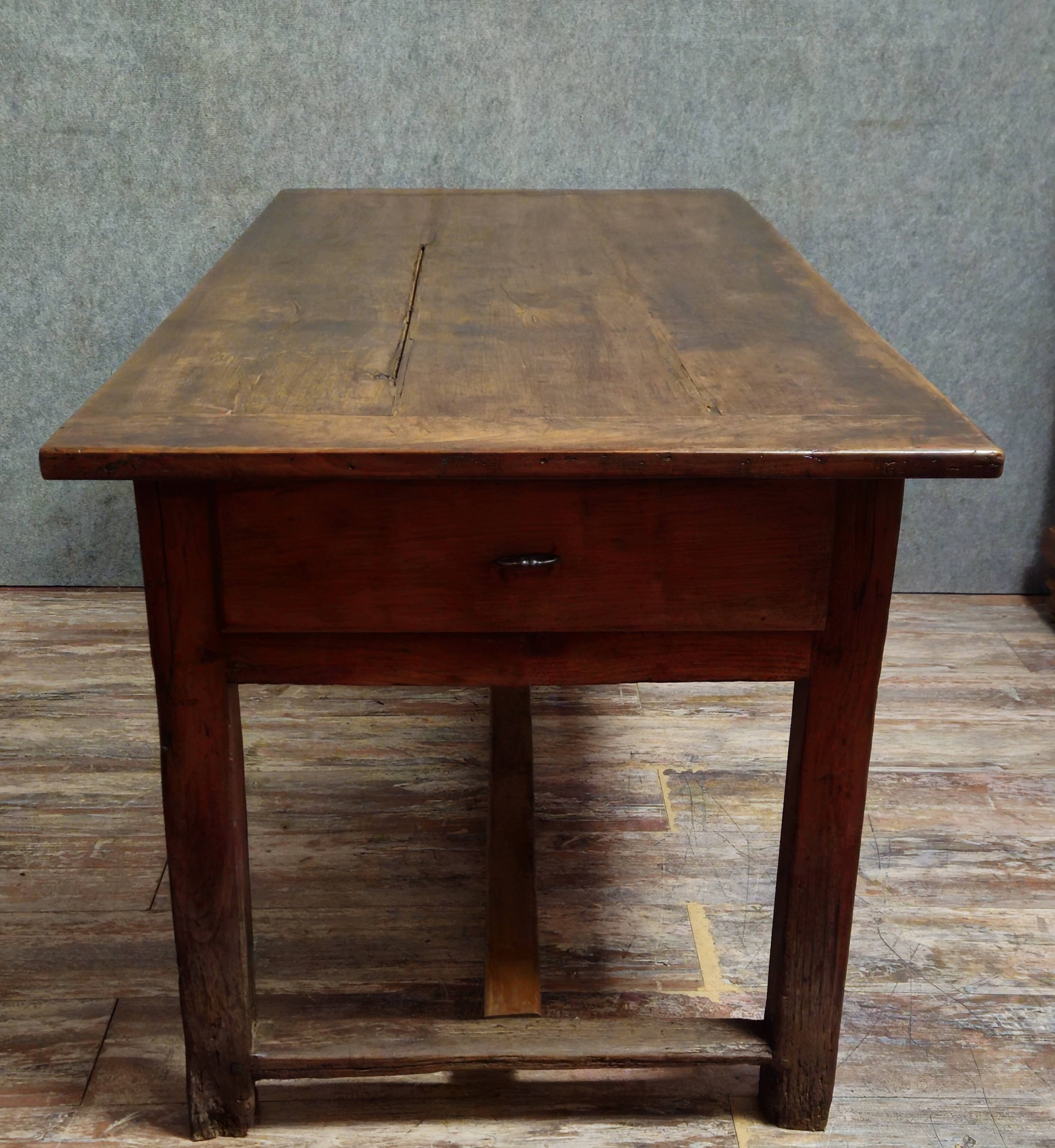 Large antique solid wood table from the Louis XIV period.