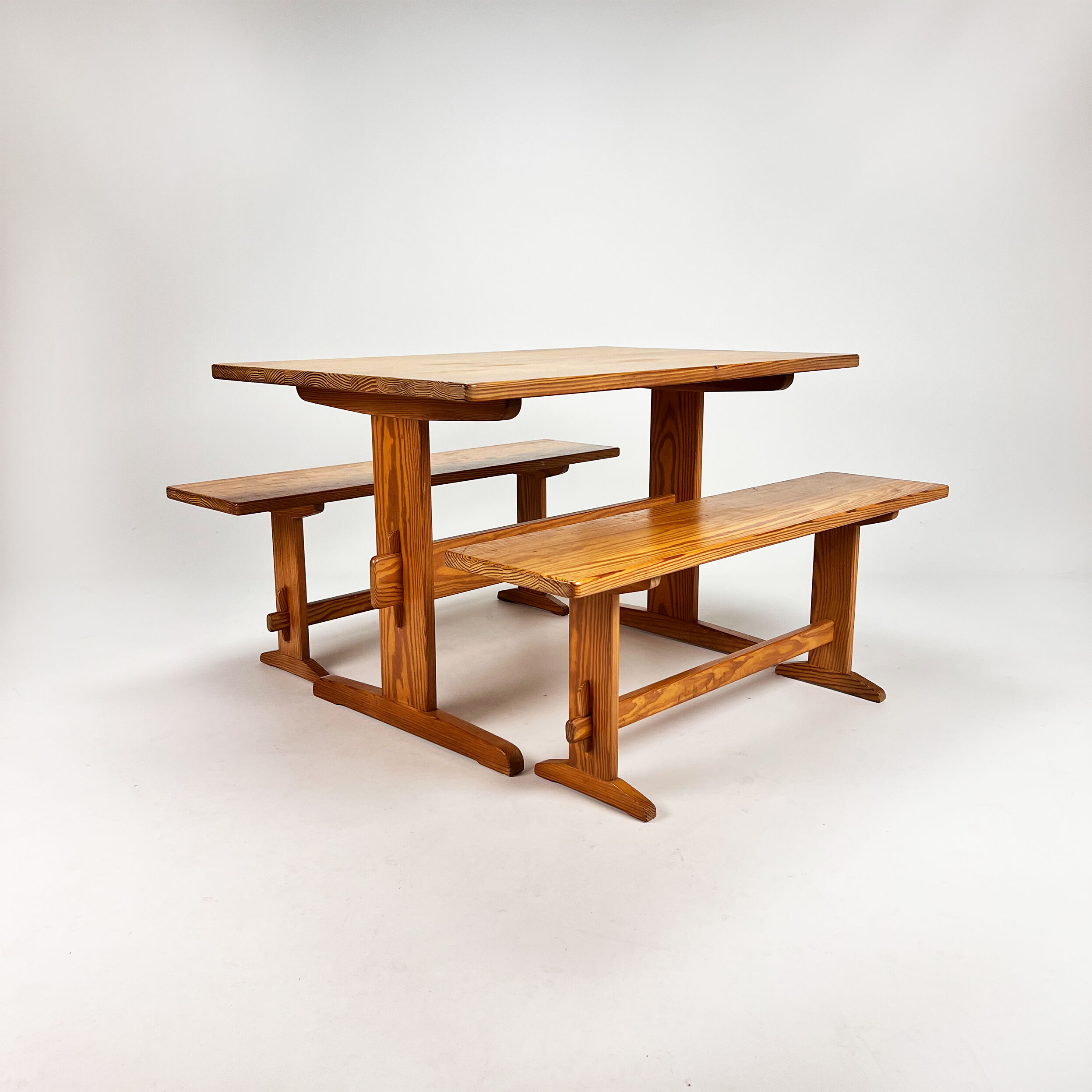 Mid century scandinavian pine dining set consists of one table and two benches, 1960s