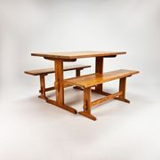 Mid century scandinavian pine dining set consists of one table and two benches, 1960s