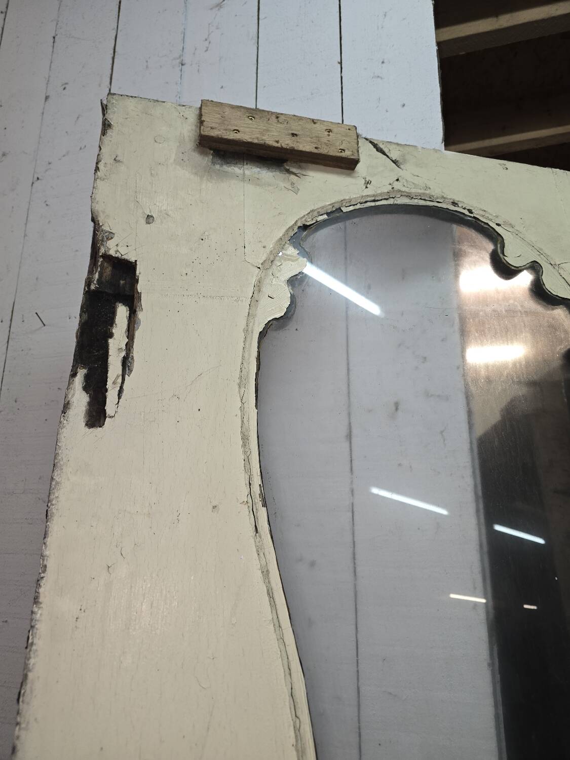 Old glass shop door in oak