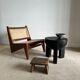 Black mango wood tripod side table with a semi-spherical top, height: 45 cm, diameter: 44 cm.