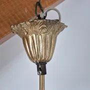 Antique chandelier with pendants, in bronze and glass pendants.