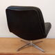 Fauteuil pivotant en skaï noir années 60
