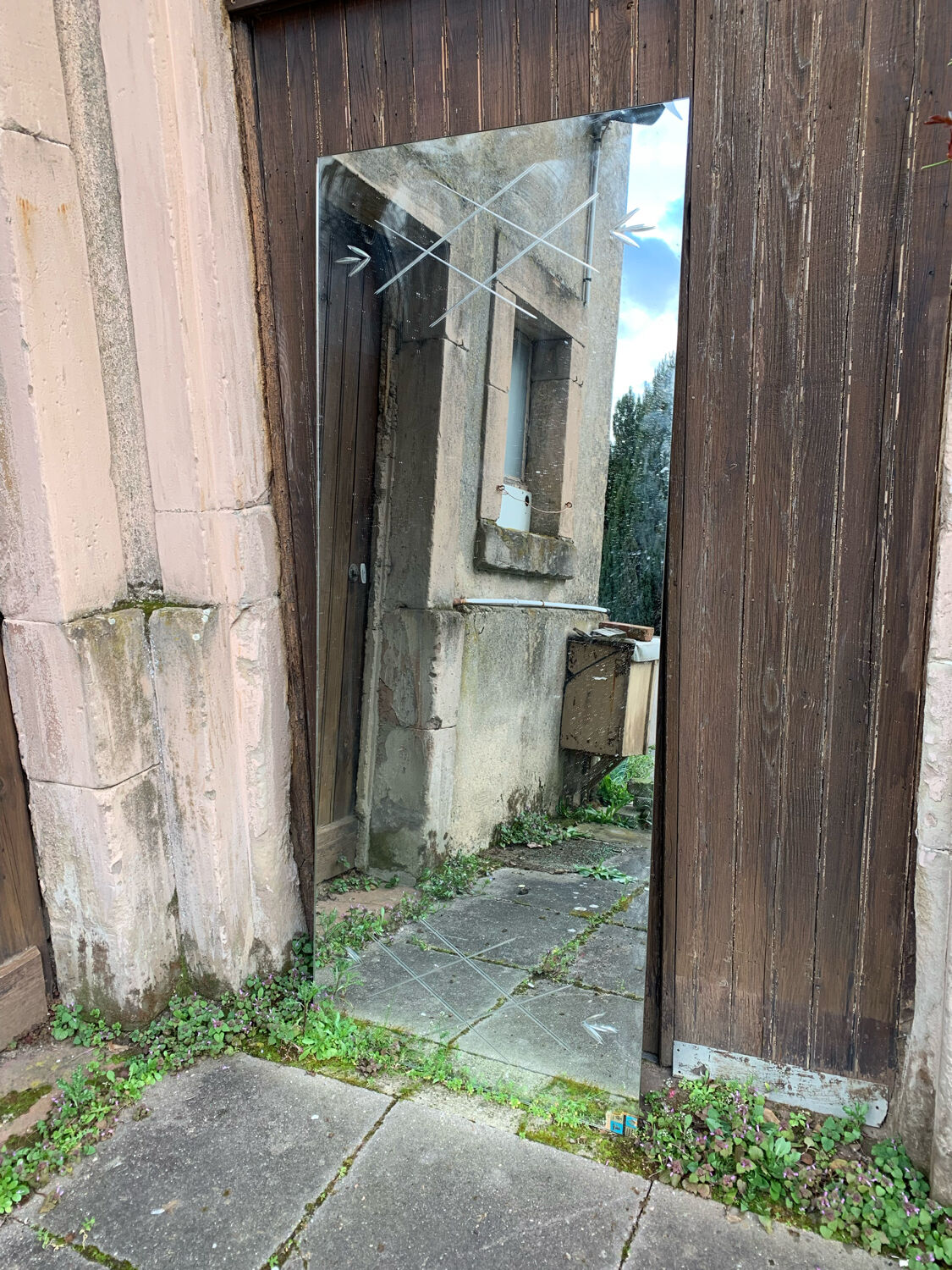 Marly brothers chiseled mirror in burgundy made in France 1950-1960