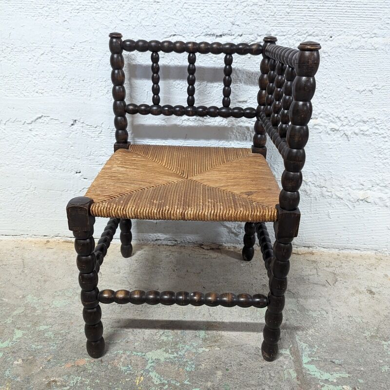 Turned wooden corner chair