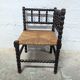 Turned wooden corner chair