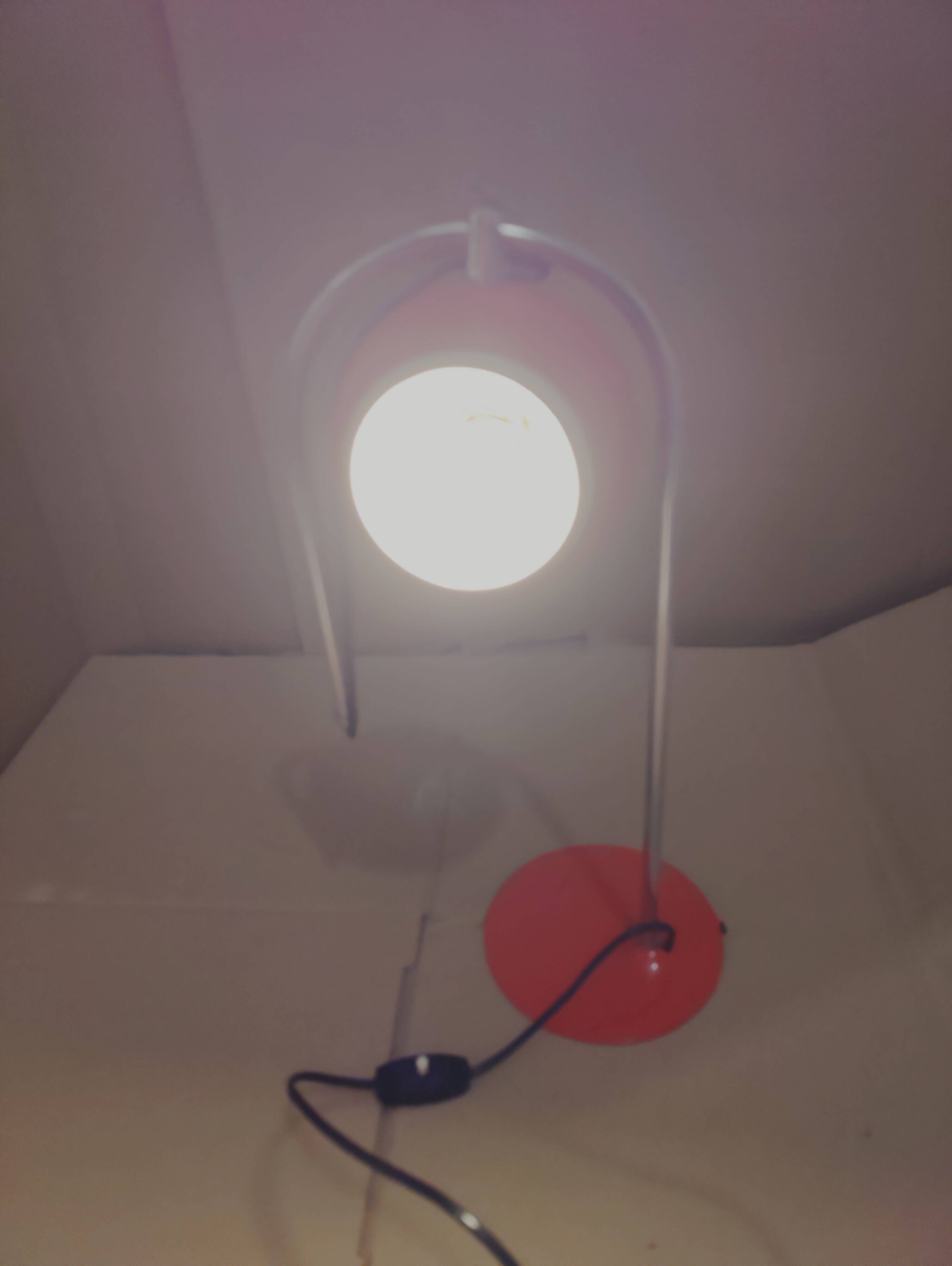 Eyeball space age orange desk or bedside lamp on an arc base