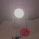Eyeball space age orange desk or bedside lamp on an arc base