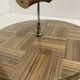 Vintage round wooden cheese board covered with glass plate with foldable handle