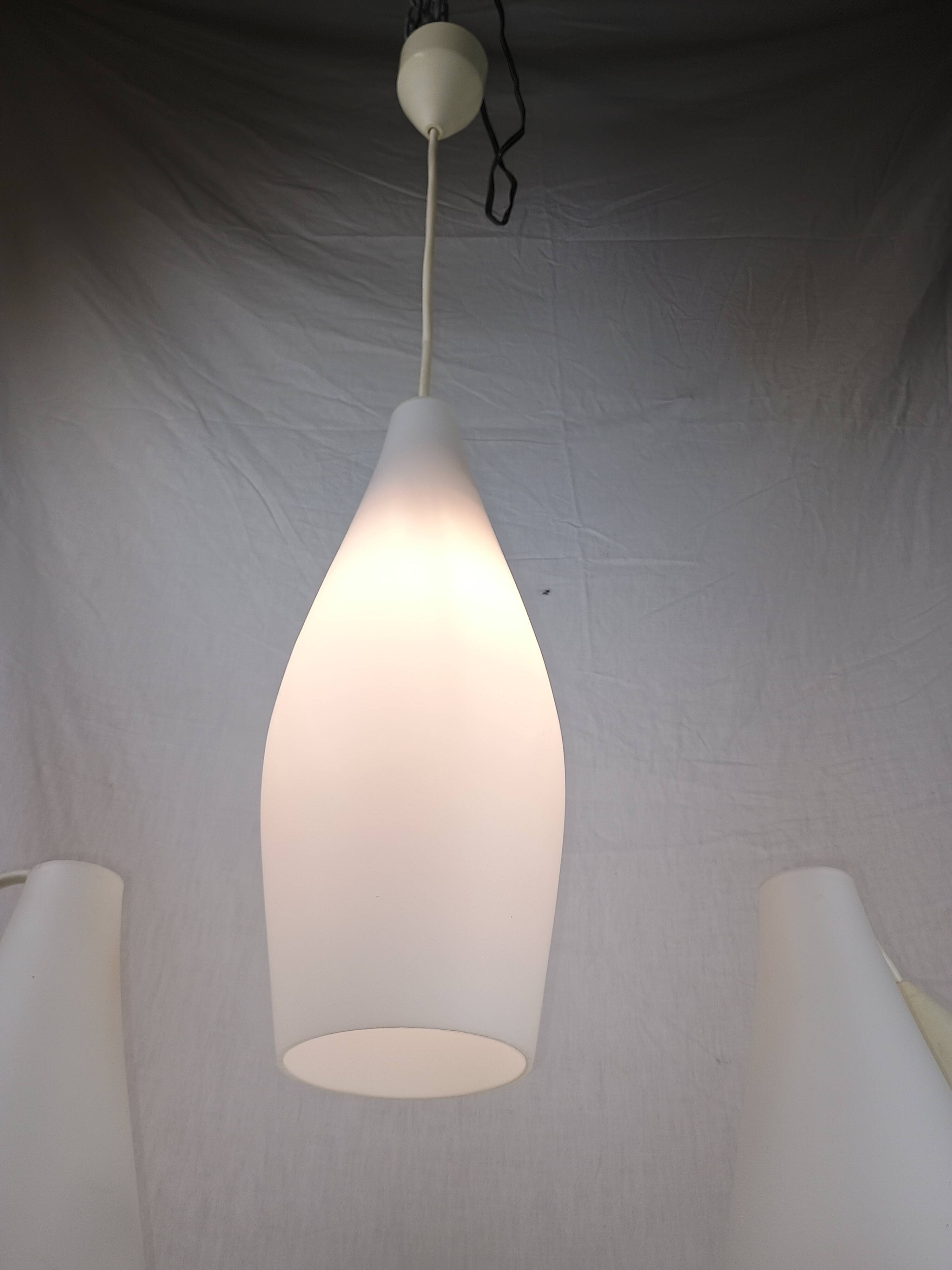 Superb set of three Holmegaard white opaline glass pendant lights