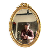 Gold oval mirror with bow decoration, Deknudt Belgium 71 x 50 cm