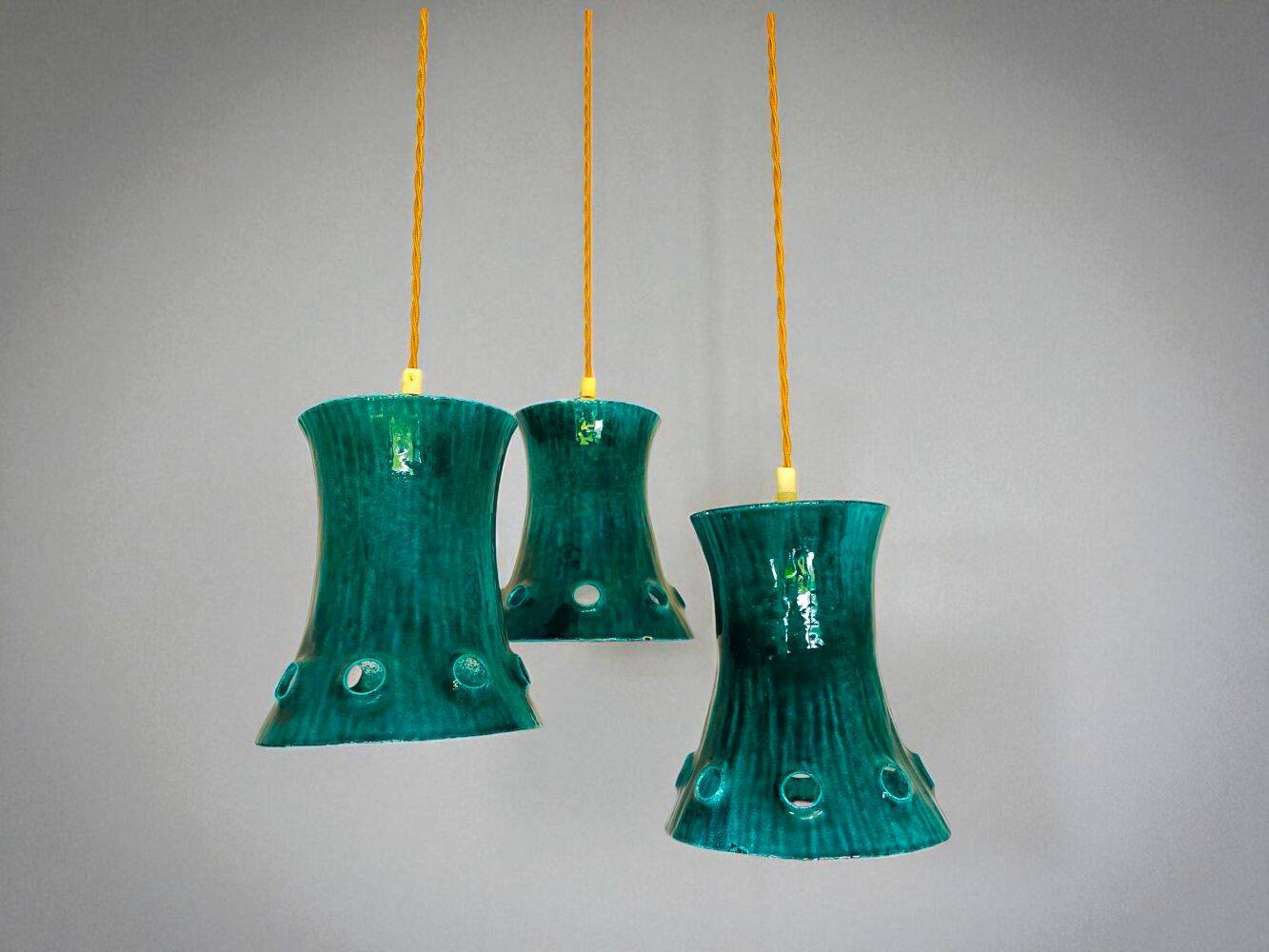 Green cast iron cascading chandelier
