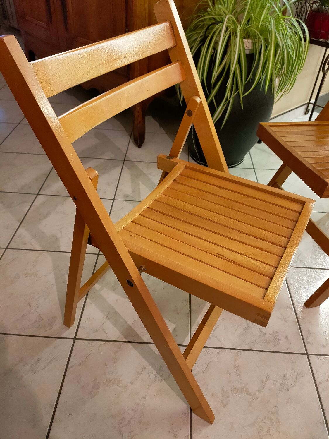 Pair of vintage folding wooden chairs