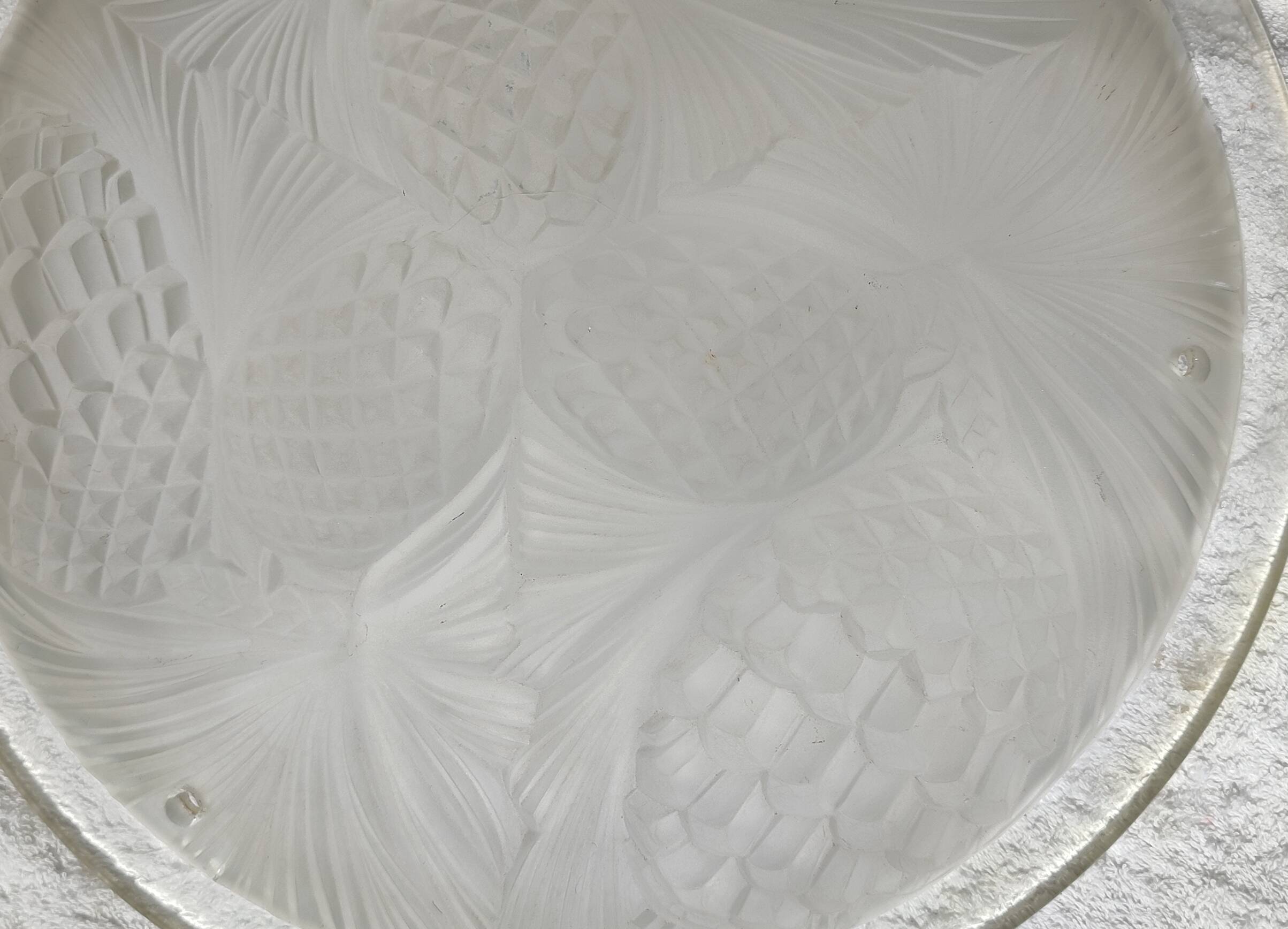 Art Deco chandelier with pine decoration.