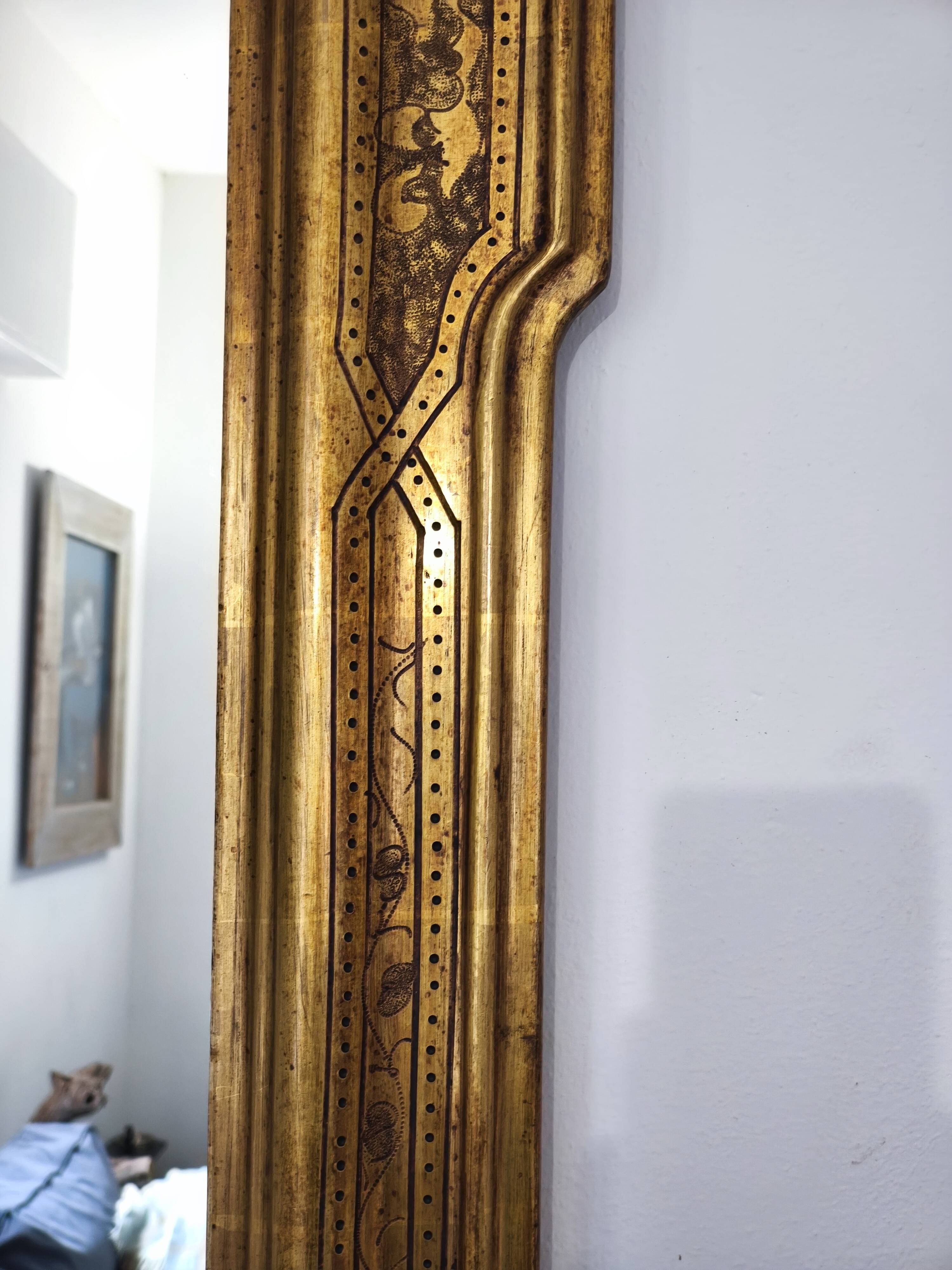 Miroir mural octogonal italien vintage en bois doré, décor bulliné