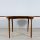 Round extendable dining table from McIntosh, 1960s