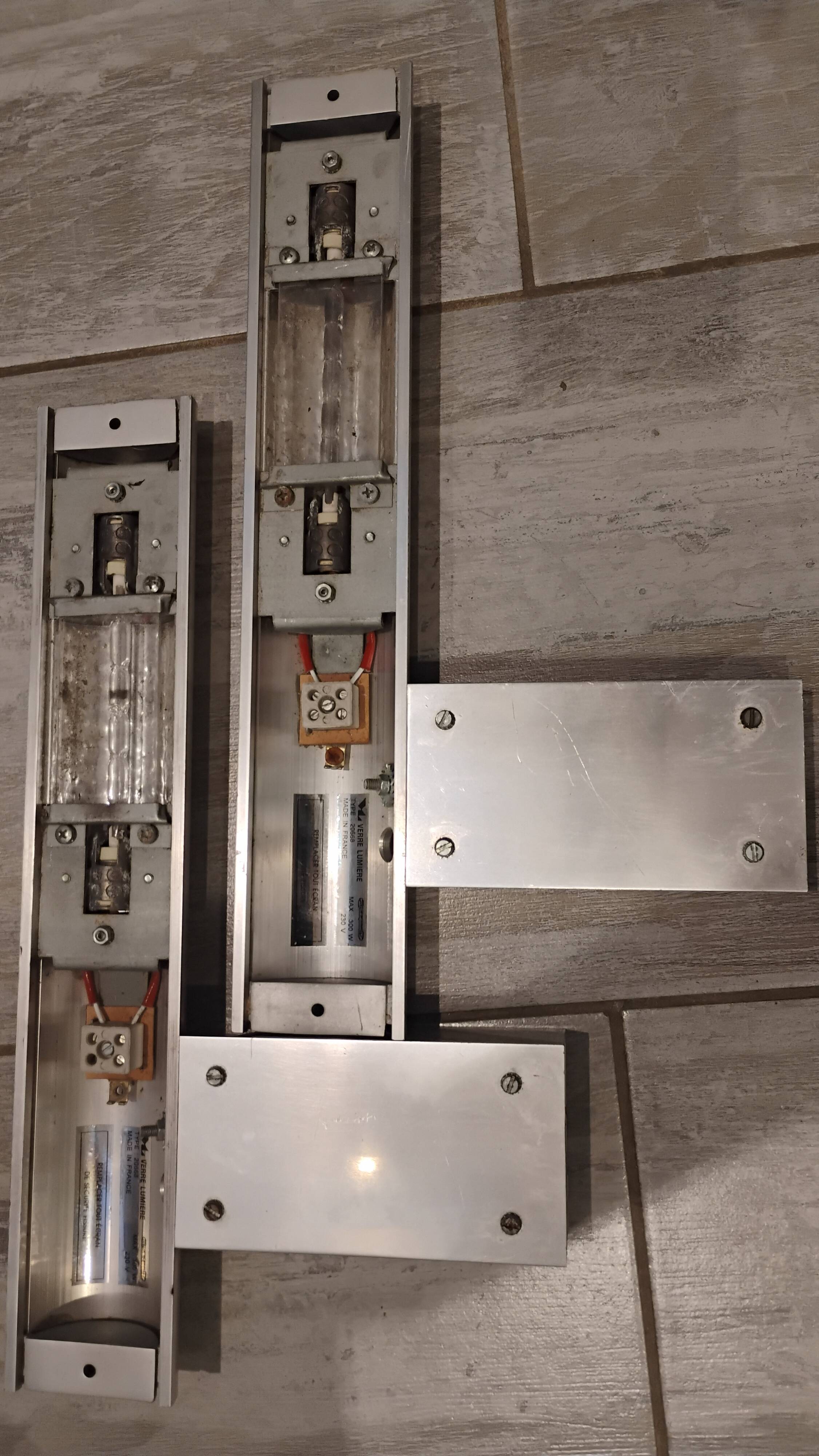 2 glass wall lights designed by Cesar Putzeys