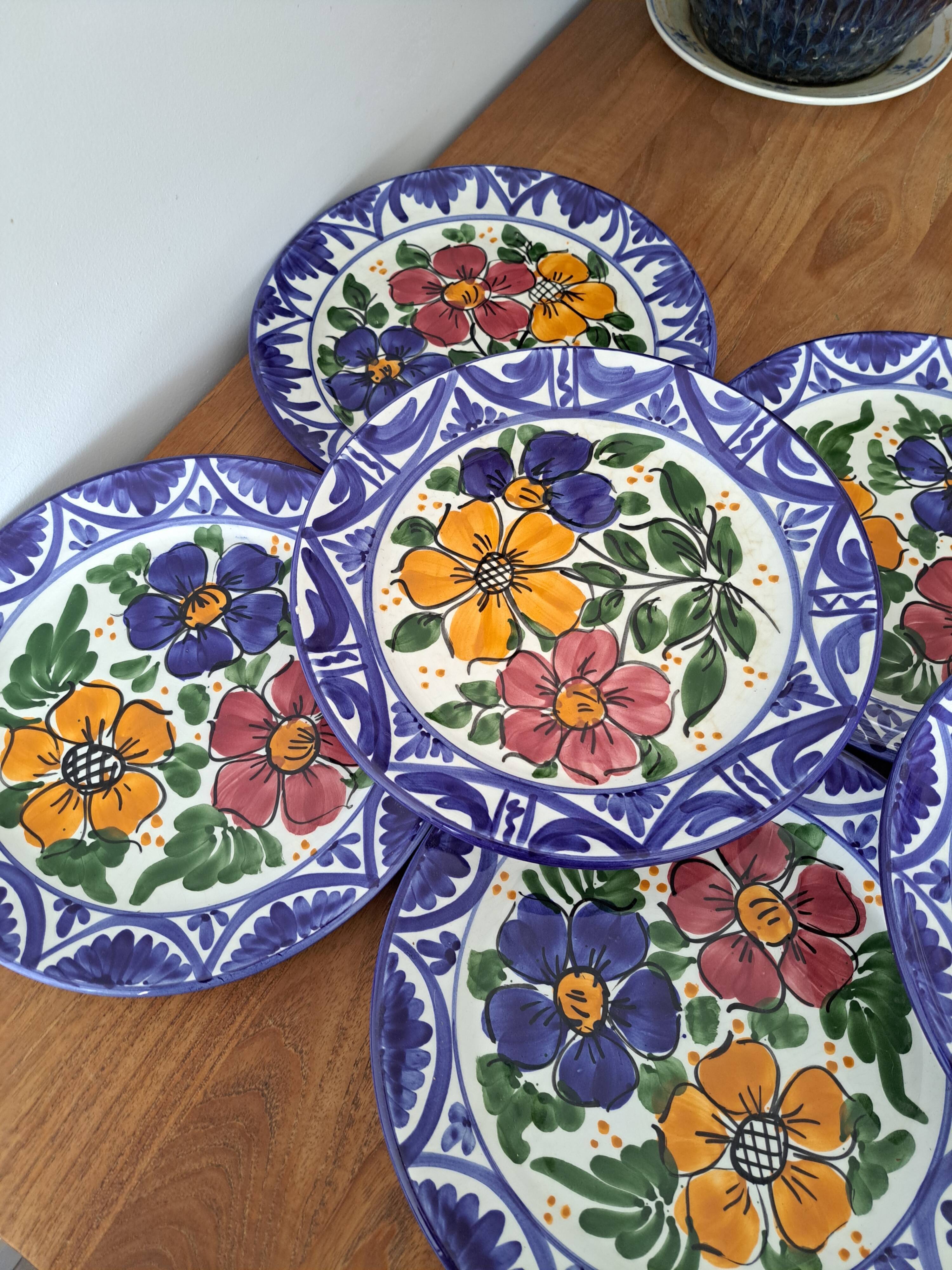 8 hand-painted plates