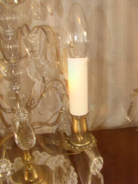 Four-candle girandole in bronze and crystal, early 20th century.