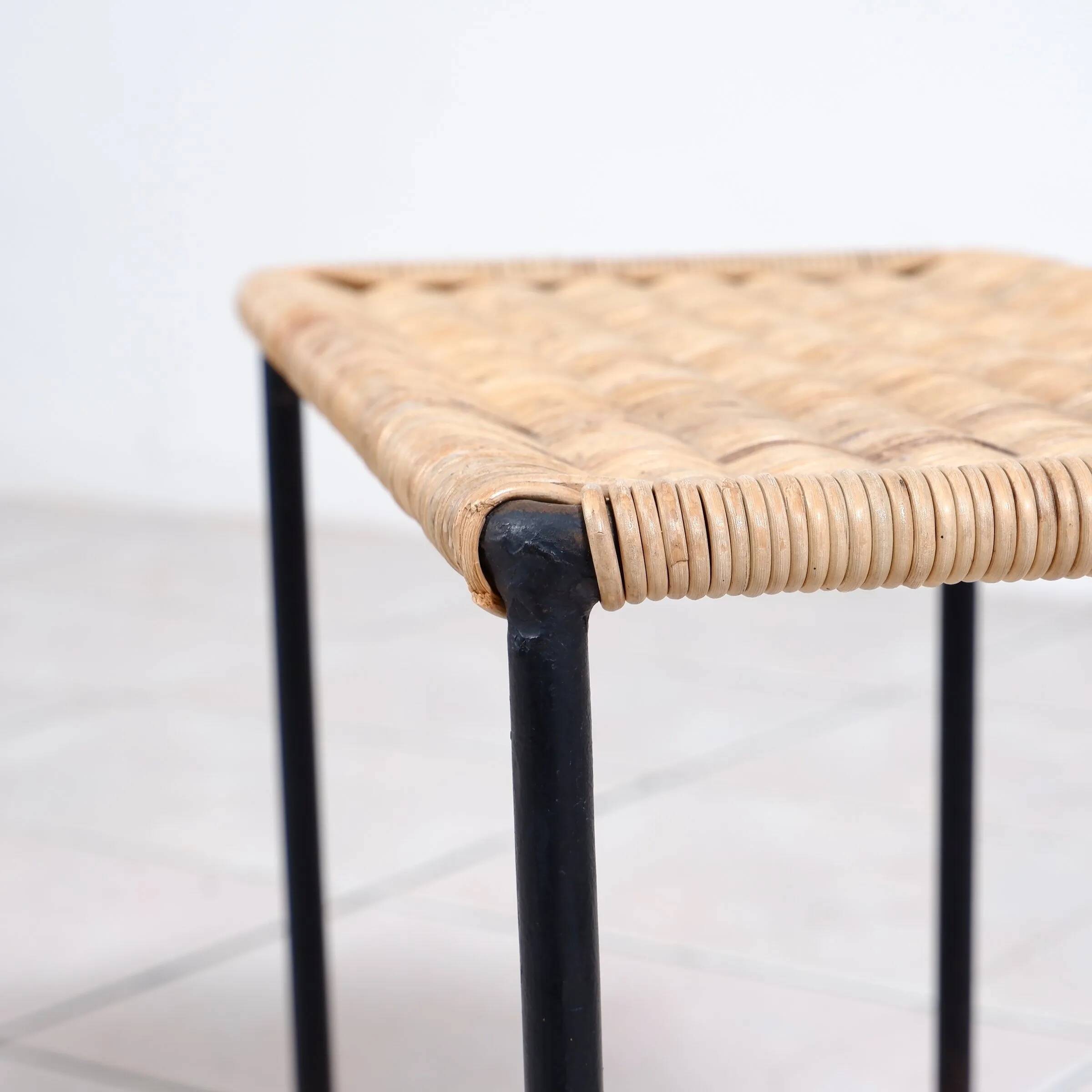 Nesting tables in metal / rattan by Carl Auböck