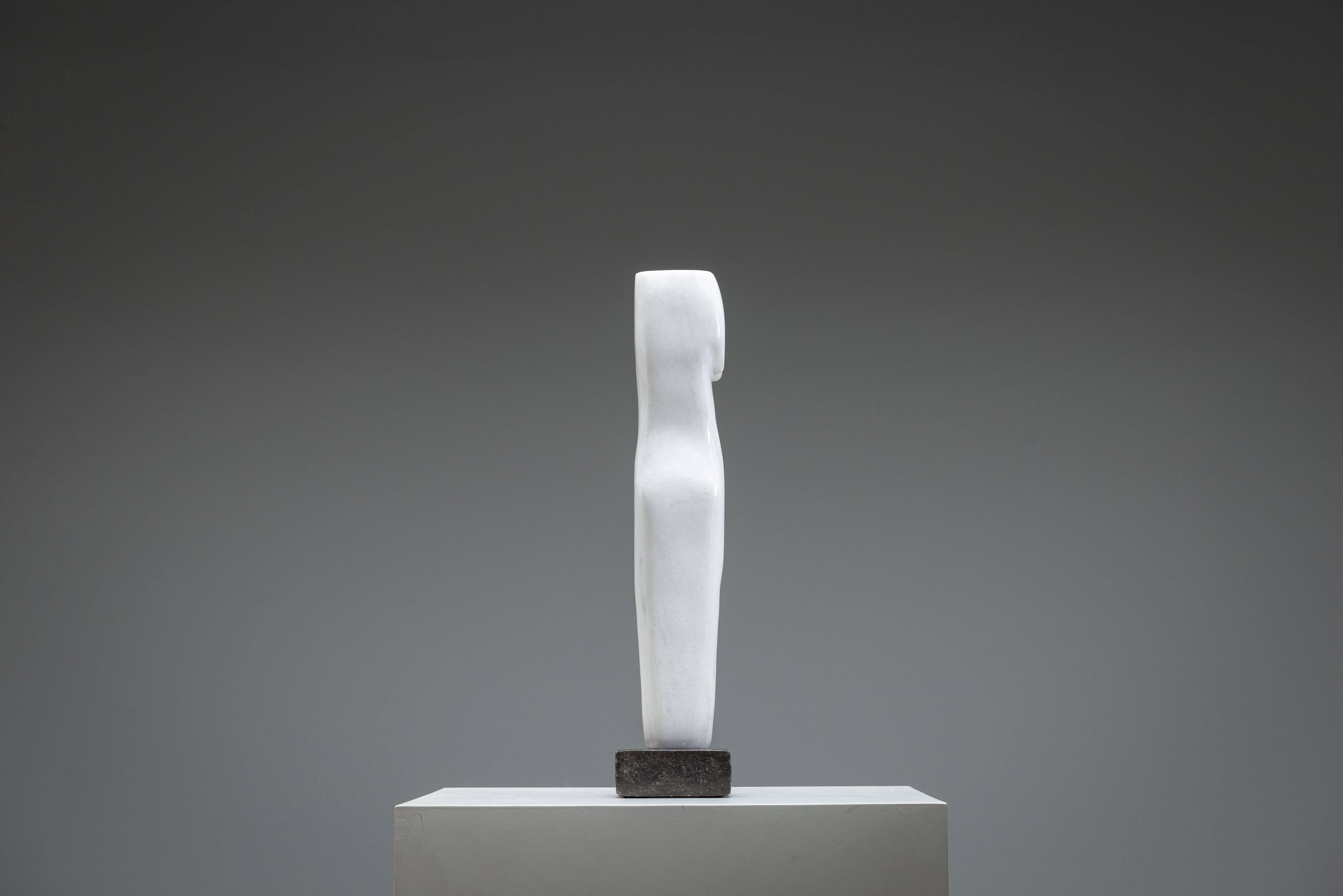Abstract solid white marble torso