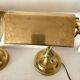 Pair of notary-style lamps in gilded metal