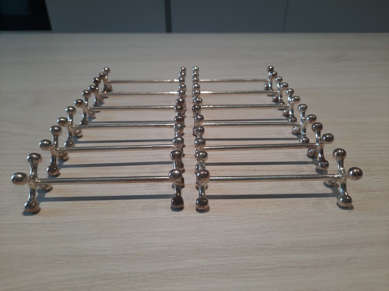 Set of 12 silver metal knife holders