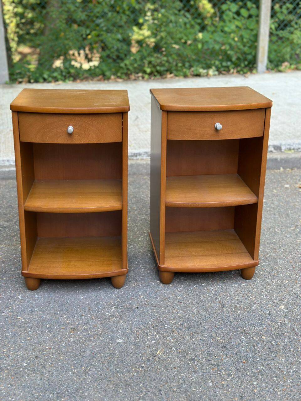 2 contemporary wooden bedside tables from the 2000s.