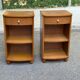 2 contemporary wooden bedside tables from the 2000s.