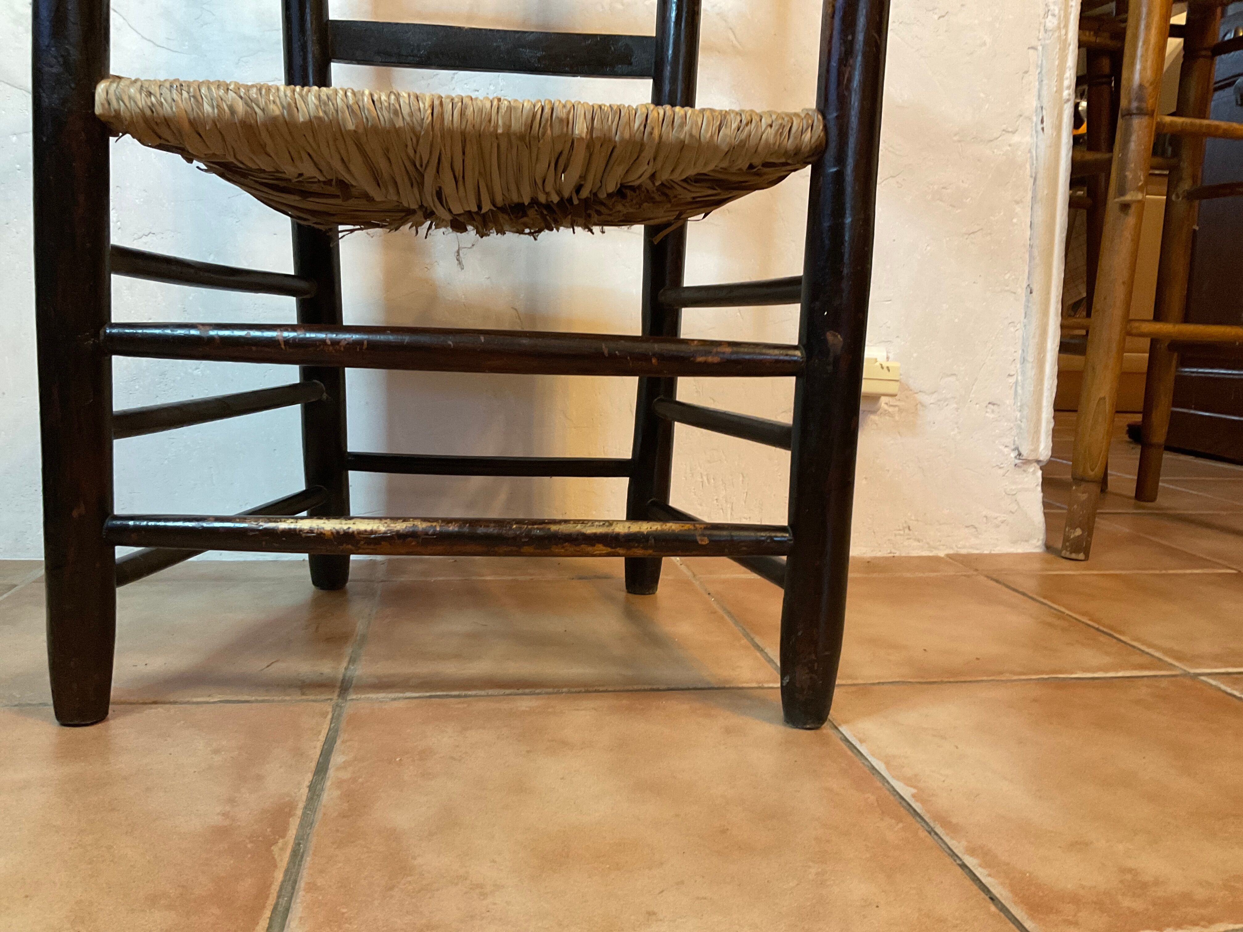 Design armchair of the 20th in straw