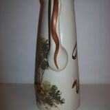 Ceramic pitcher with hand-painted decoration