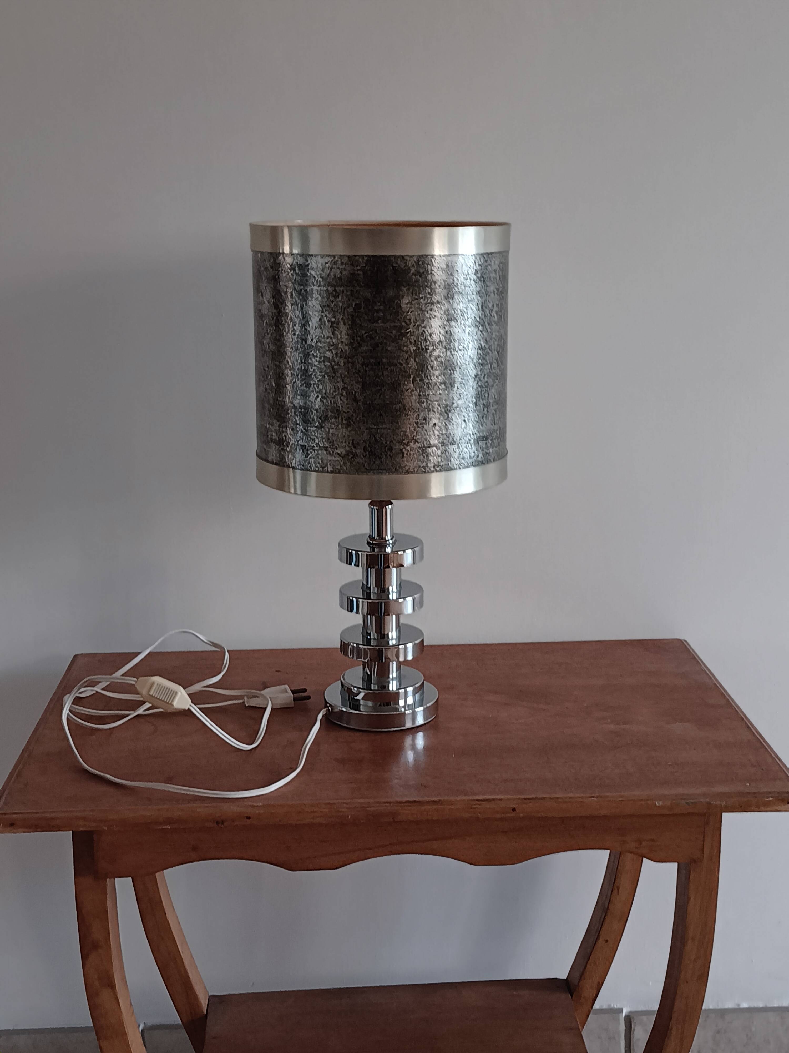 Chromed metal lamp and metallic paper lampshade. 70s