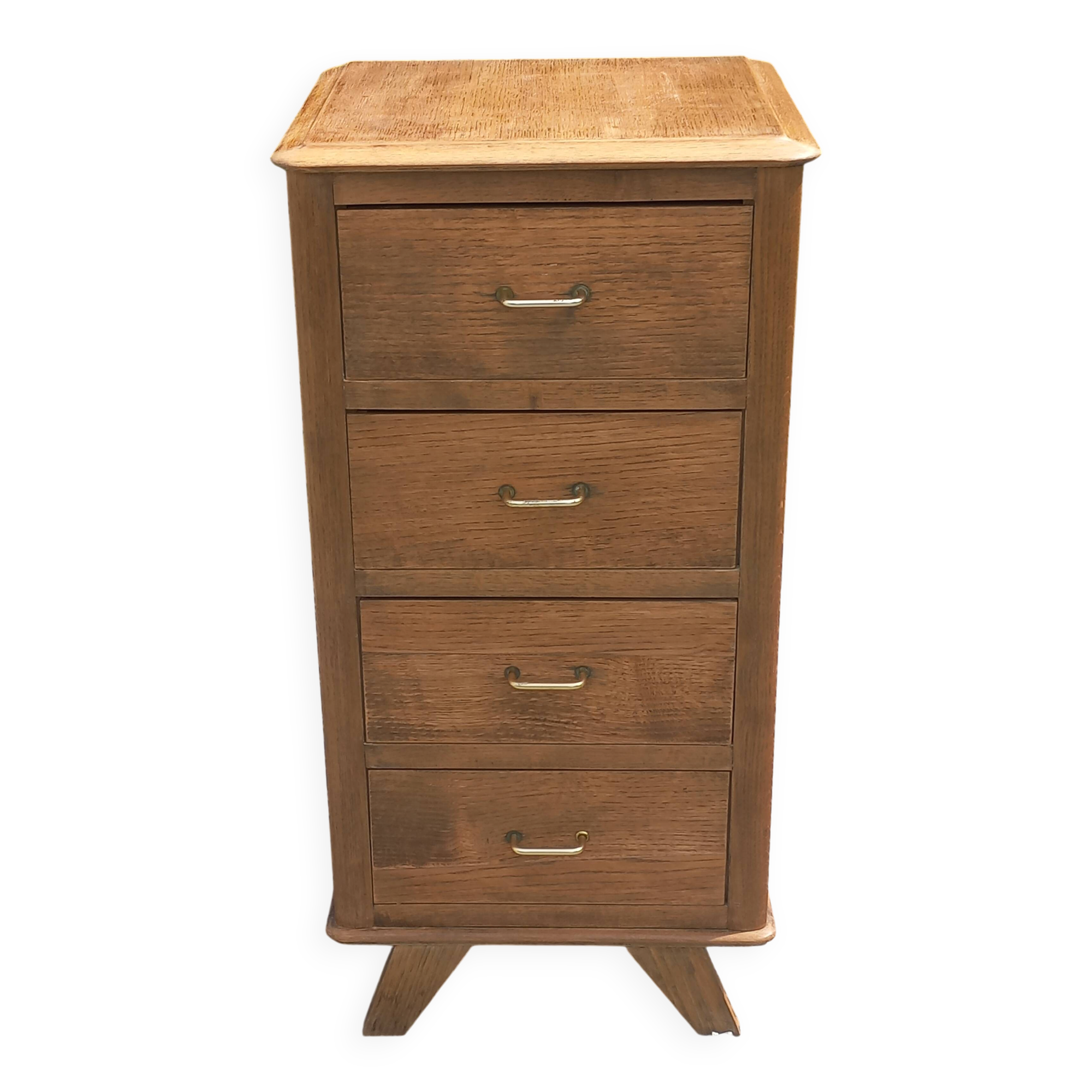 Vintage oak chest of drawers with tapered legs from the 1950s.