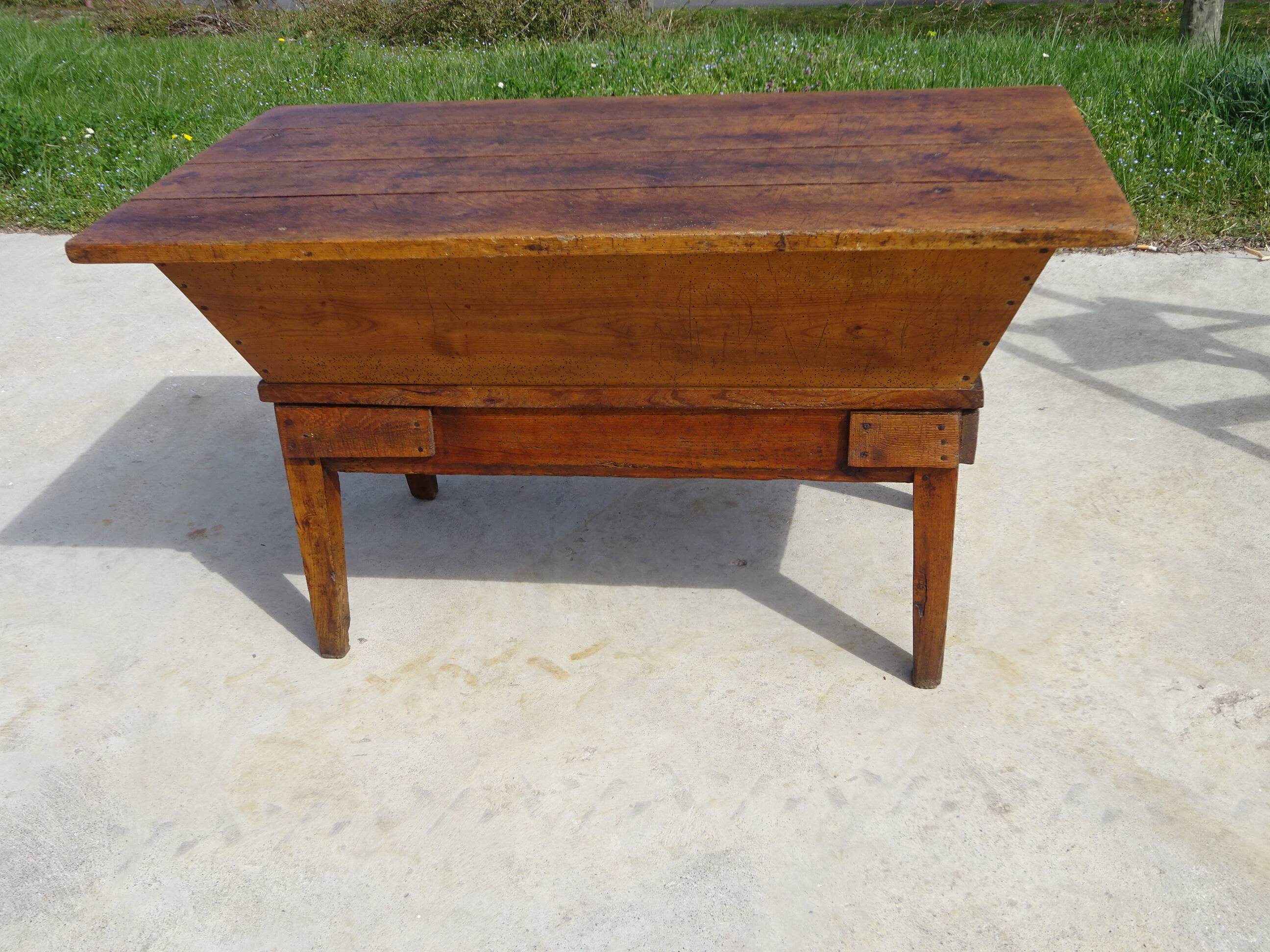Very old solid oak dough trough with a lid and removable legs.