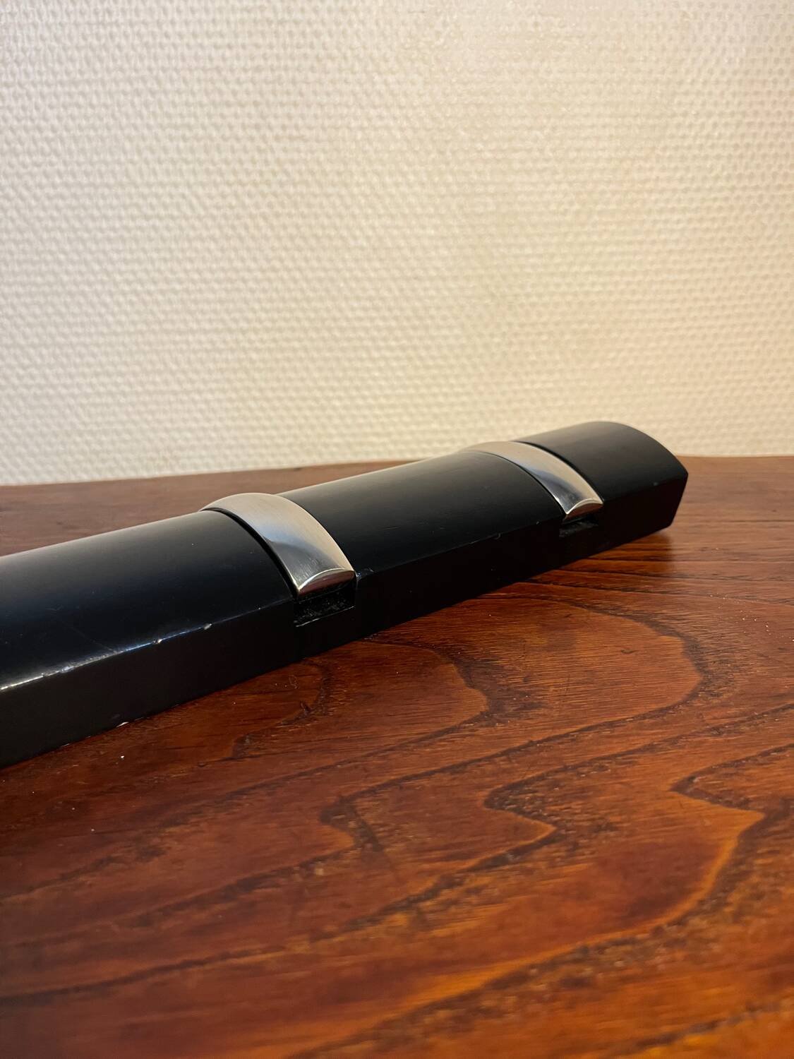 Designer metal and wood wall coat rack