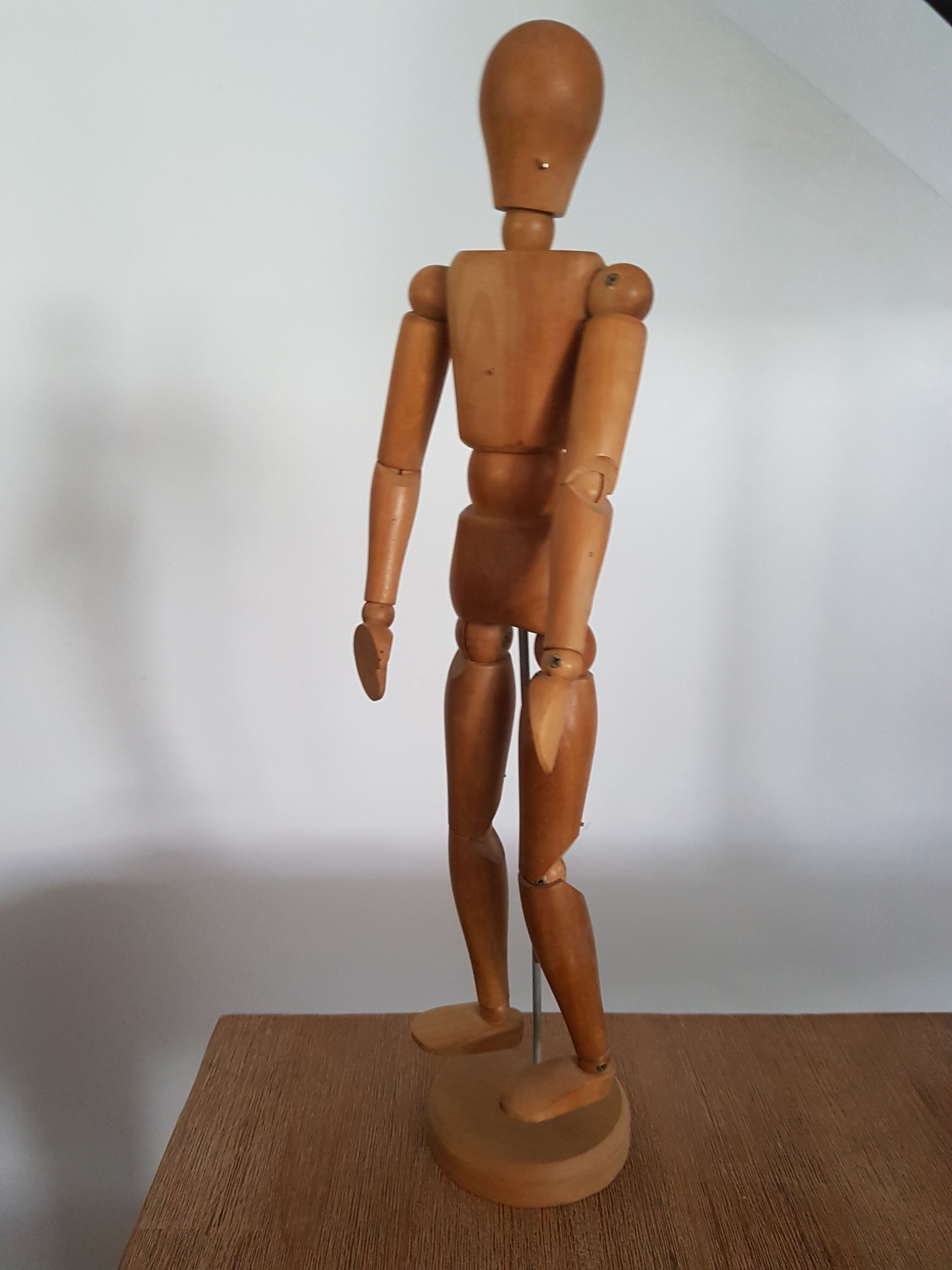 Articulated waxed wood puppet and 80's support