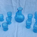 Set of jug and 10 blue glass goblets with floral motifs