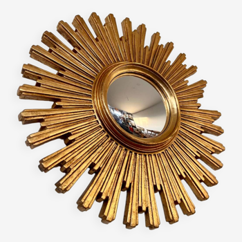 Old large golden sun mirror with rounded witch's eye in vintage resin from the 70s