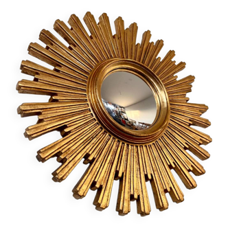 Old large golden sun mirror with rounded witch's eye in vintage resin from the 70s