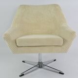 Cream corduroy swivel shell armchairs