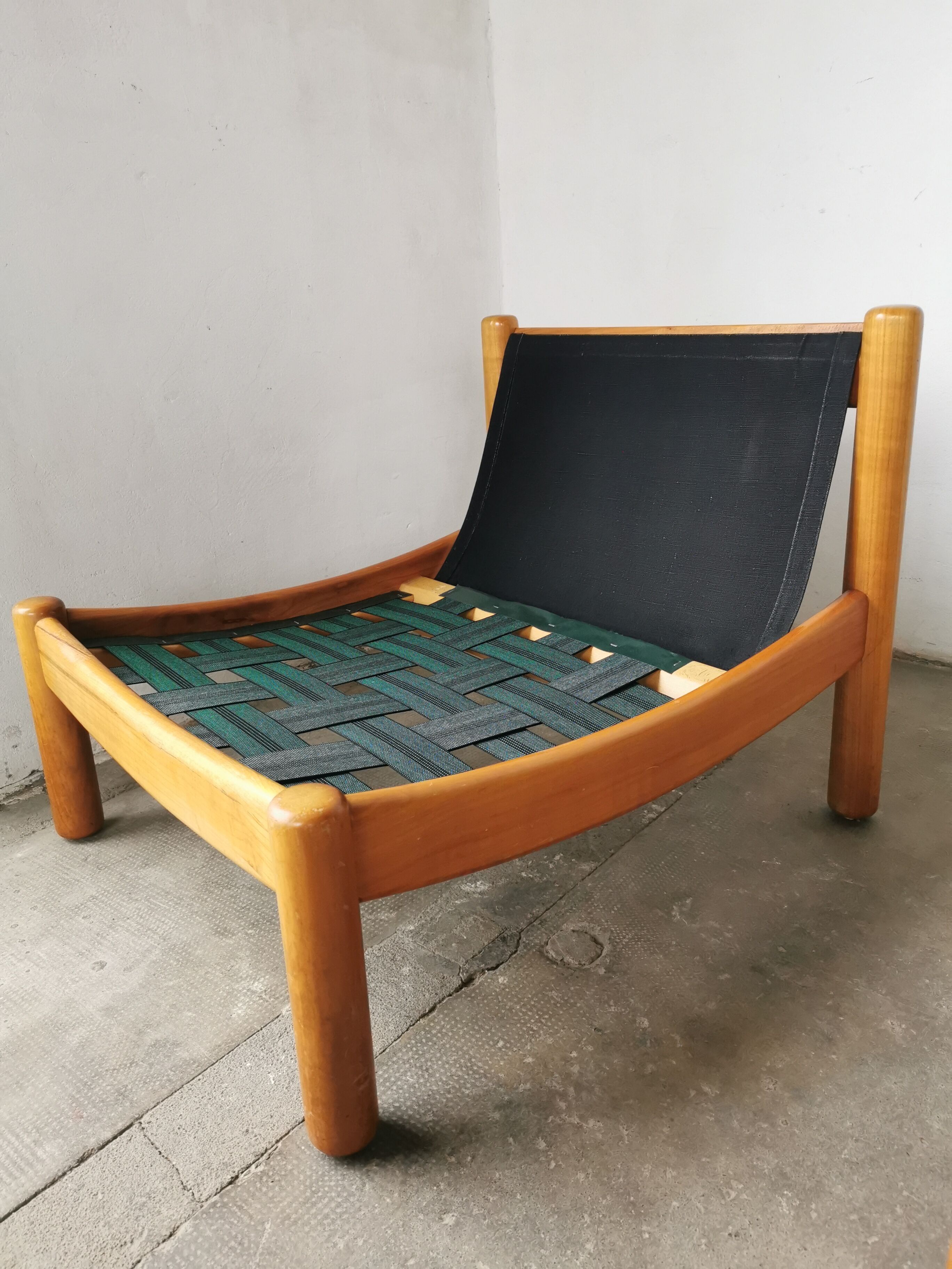 Pair of designer leather armchairs 80s