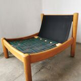 Pair of designer leather armchairs 80s