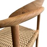 solid wood chair with woven seat and armrests
