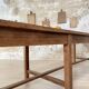 Solid wood workshop table with straight legs.
