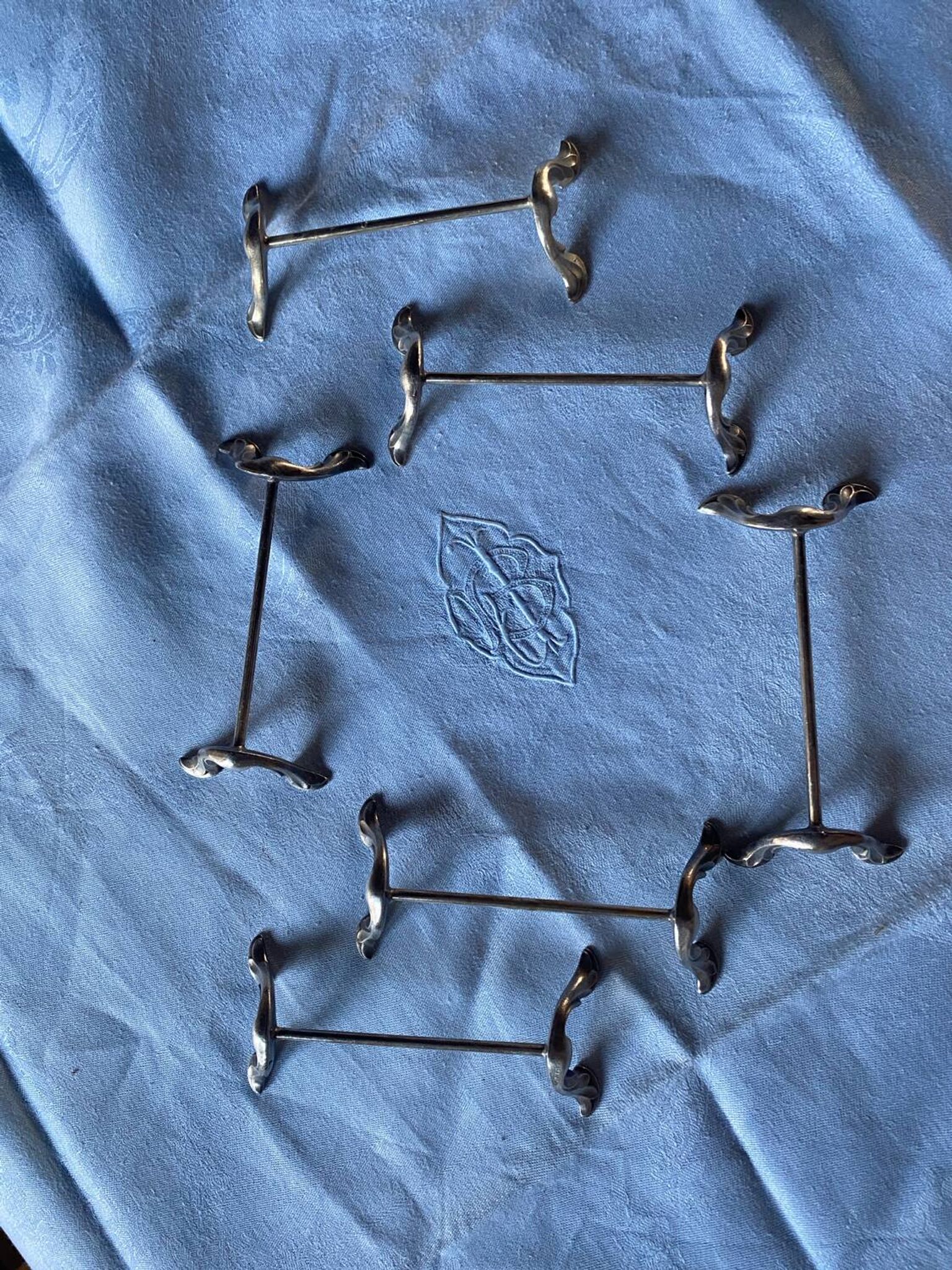 6 porte-couteaux anciens en métal argenté