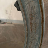 Patinated oval mirror