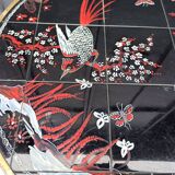 Round coffee table with Japanese bird and flower decor