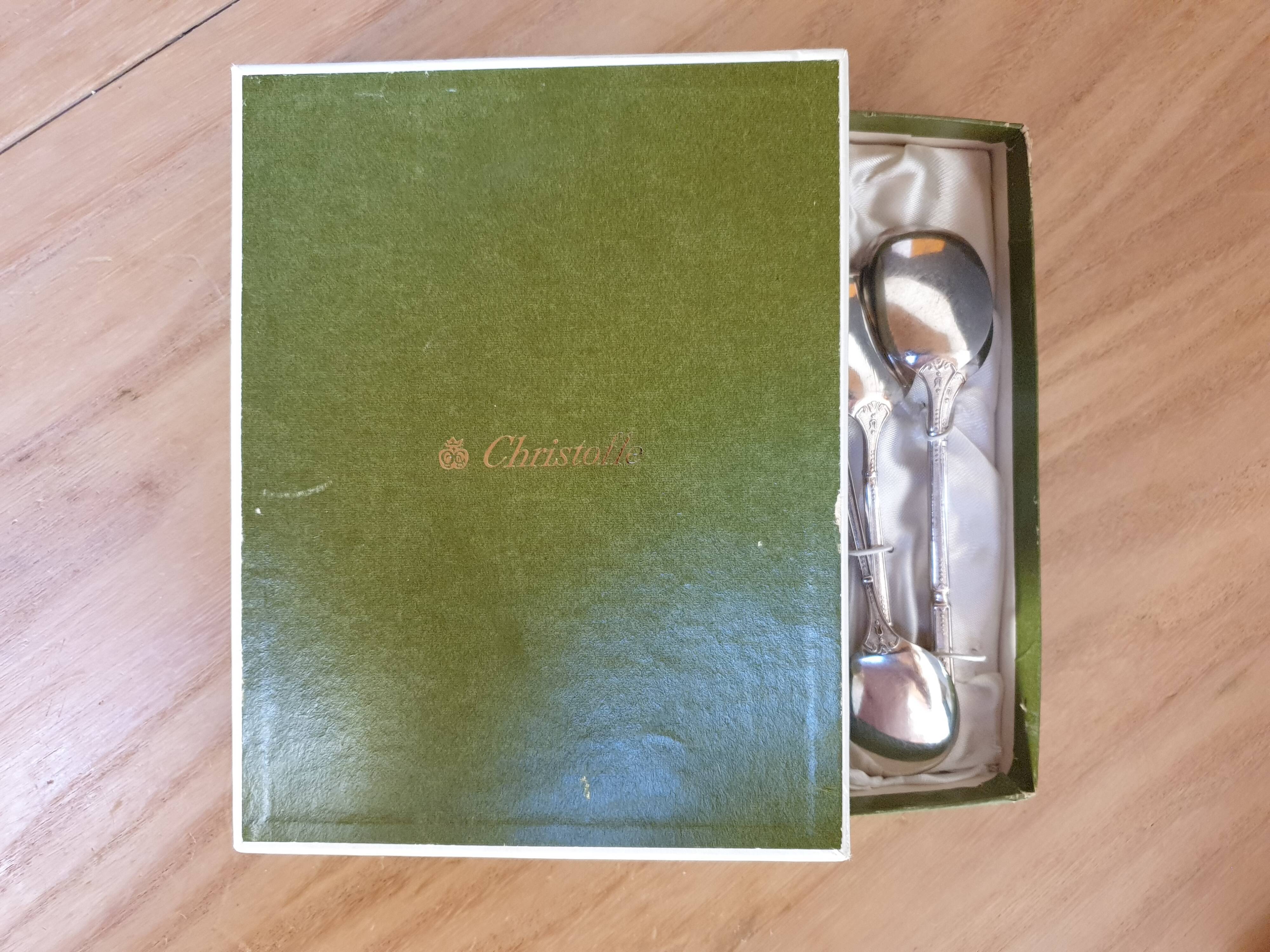 Punched silver metal ice spoons